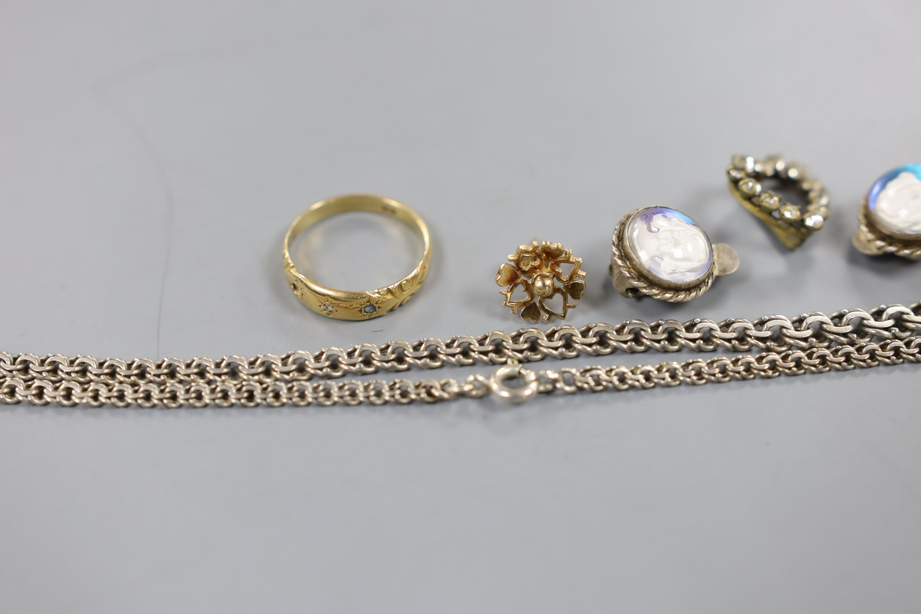 An 18ct and gem set ring (stone missing), gross 2.4 grams, a 9ct and opal double set pendant necklace (a.f.), gross 3.4 grams and other minor jewellery.
